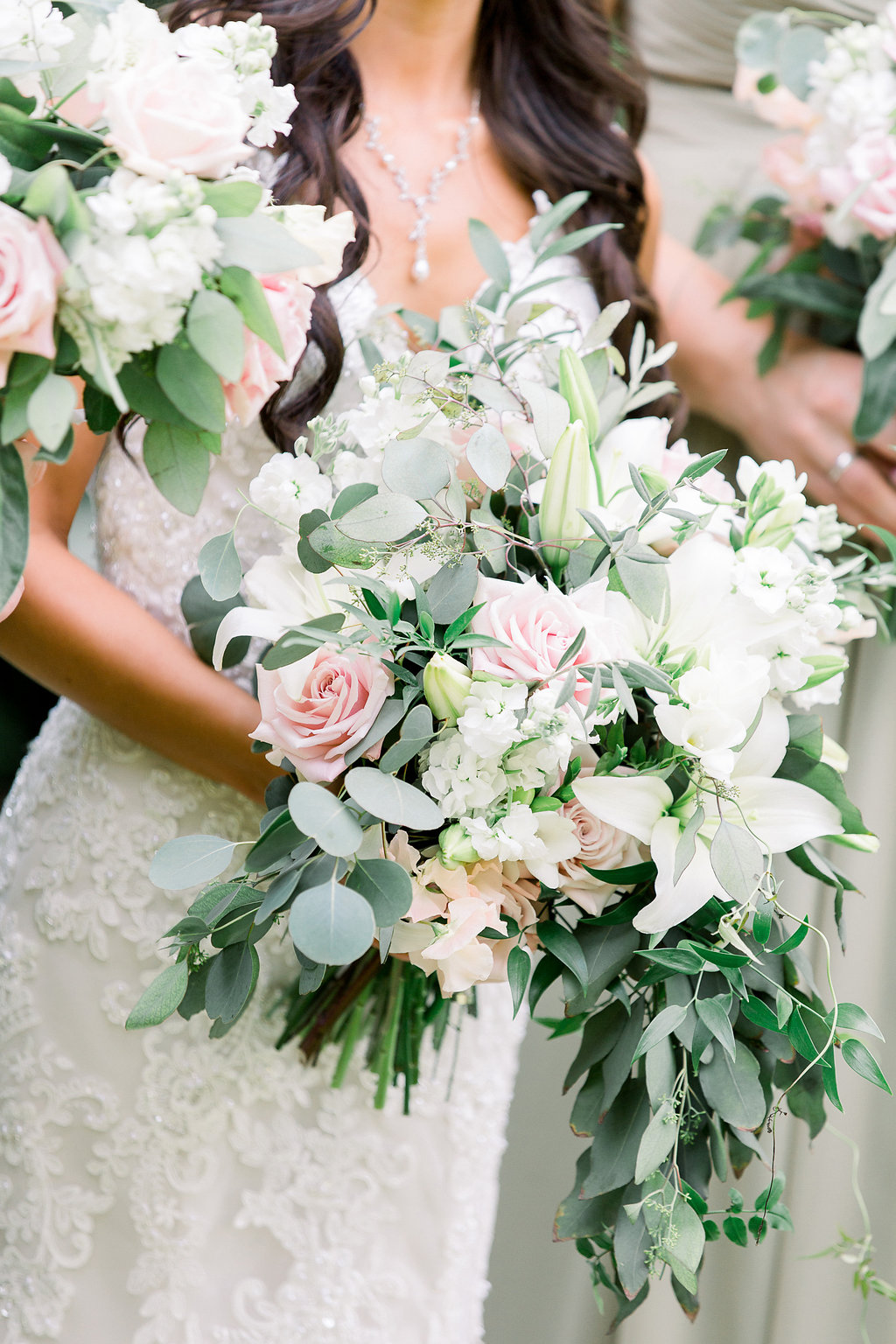 Bridal Bouquet in soft Blush and White with lots of lush foliage.